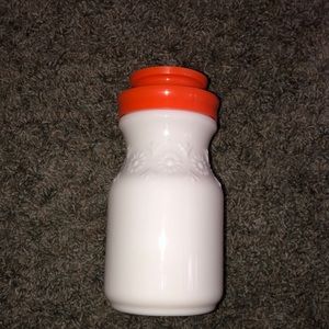 Vintage milkglass tang jar with original lid.